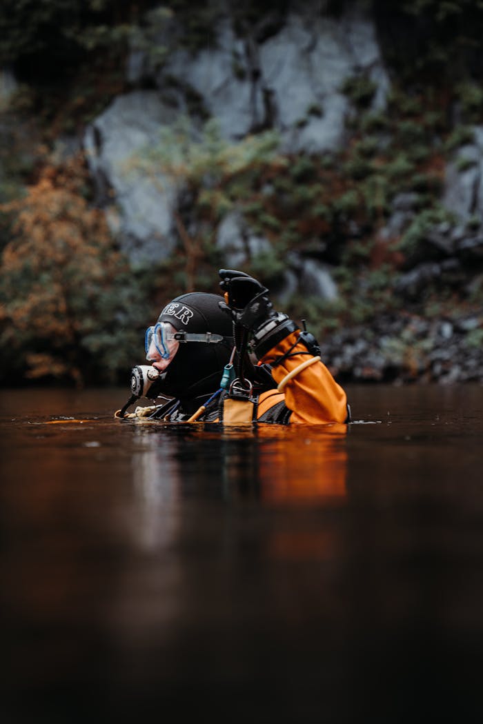 A scuba diver in full gear enjoying a tranquil dive in the calm waters of Wales.